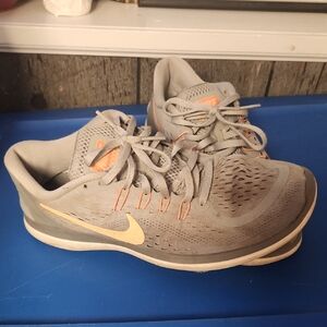 Nike Women's Gray and Orange Athletic Shoes